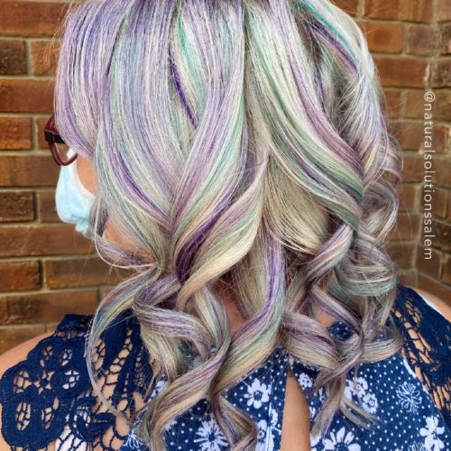 medium length womens hairstyle with pastel highlights in salem ohio