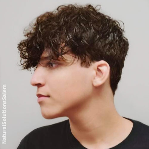 a teenage mens haircut for curly hair that is long on top