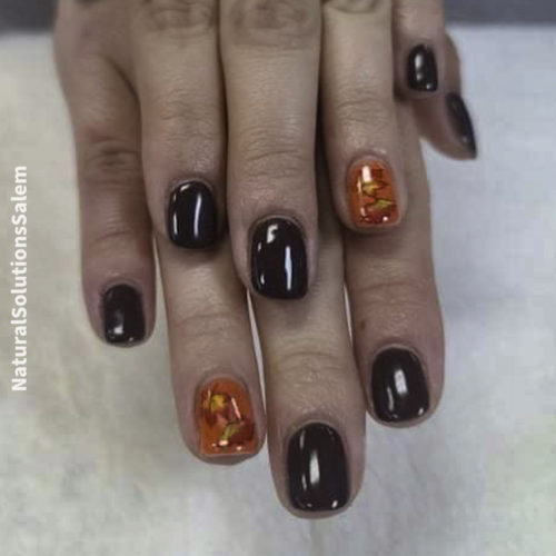 shellac gel polish manicure with fall leaf design at Natural Solutions