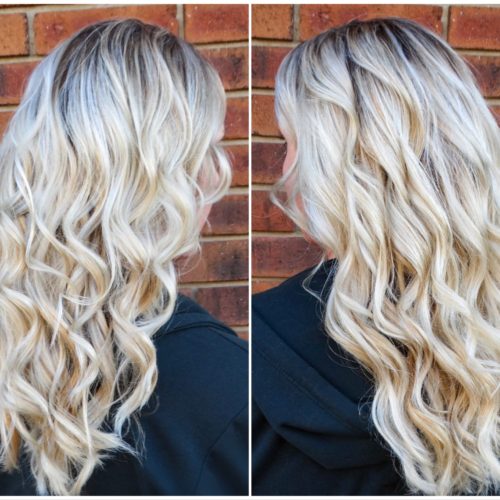 platinum blonde with dark shadow root on long hairstyles for women