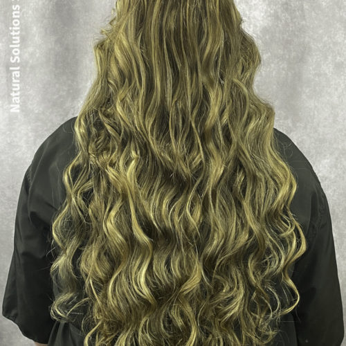 long womens hairstyles include all over highlights and curls
