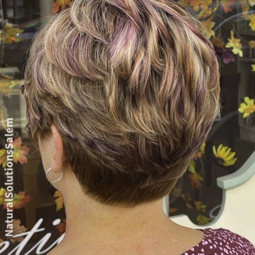 purplish pink color foil highlights with caramel tones is a beautiful haircolor for women