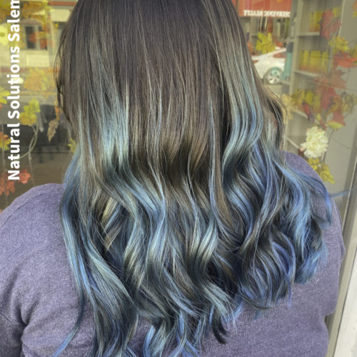blue teal highlights  on long hairstyles are trending in salem ohio