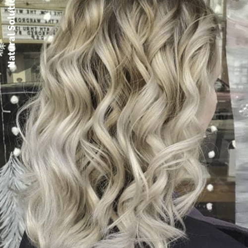 curled blonde balayage hairstyles for women in salem ohio by Jesenia Mrofchak