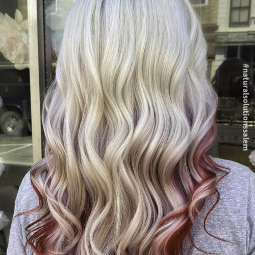 beautiful wavy platinum curls blended with red lowlights in Salem Ohio