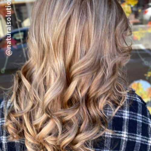 michele gave her clients some ashy deeper blonde highlights along with pieces of brighter ones for a very beautiful effect